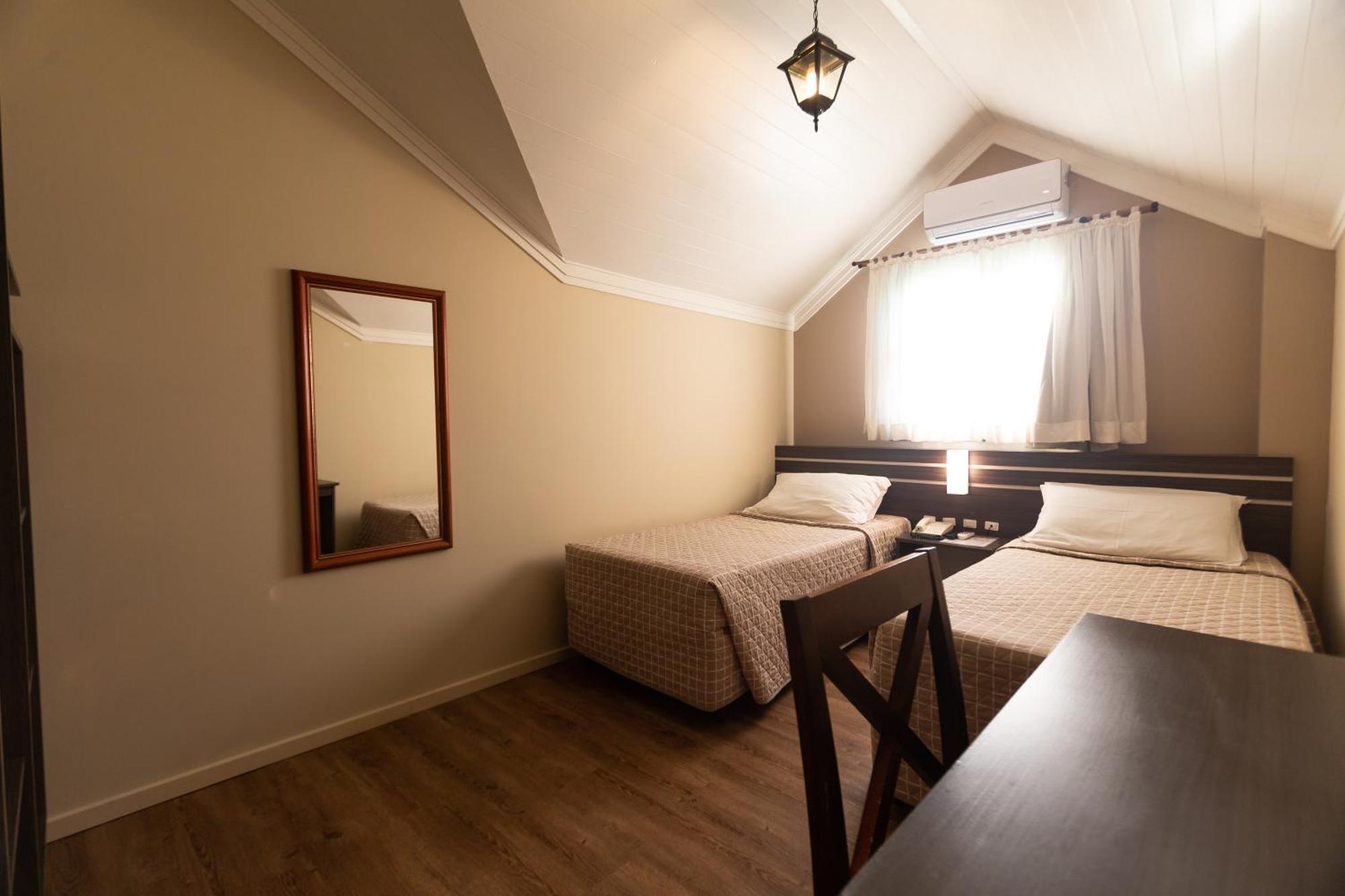 Quarto Deluxe com 2 Camas de Solteiro